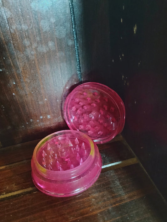 Pink and clear grinder